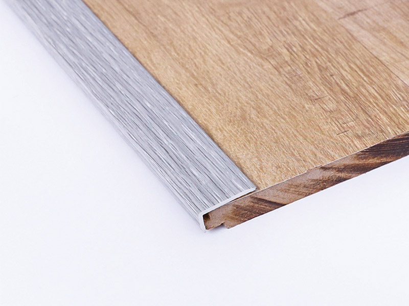 Tiras de borda de piso laminado em PVC de 24 * 10 mm em forma de L